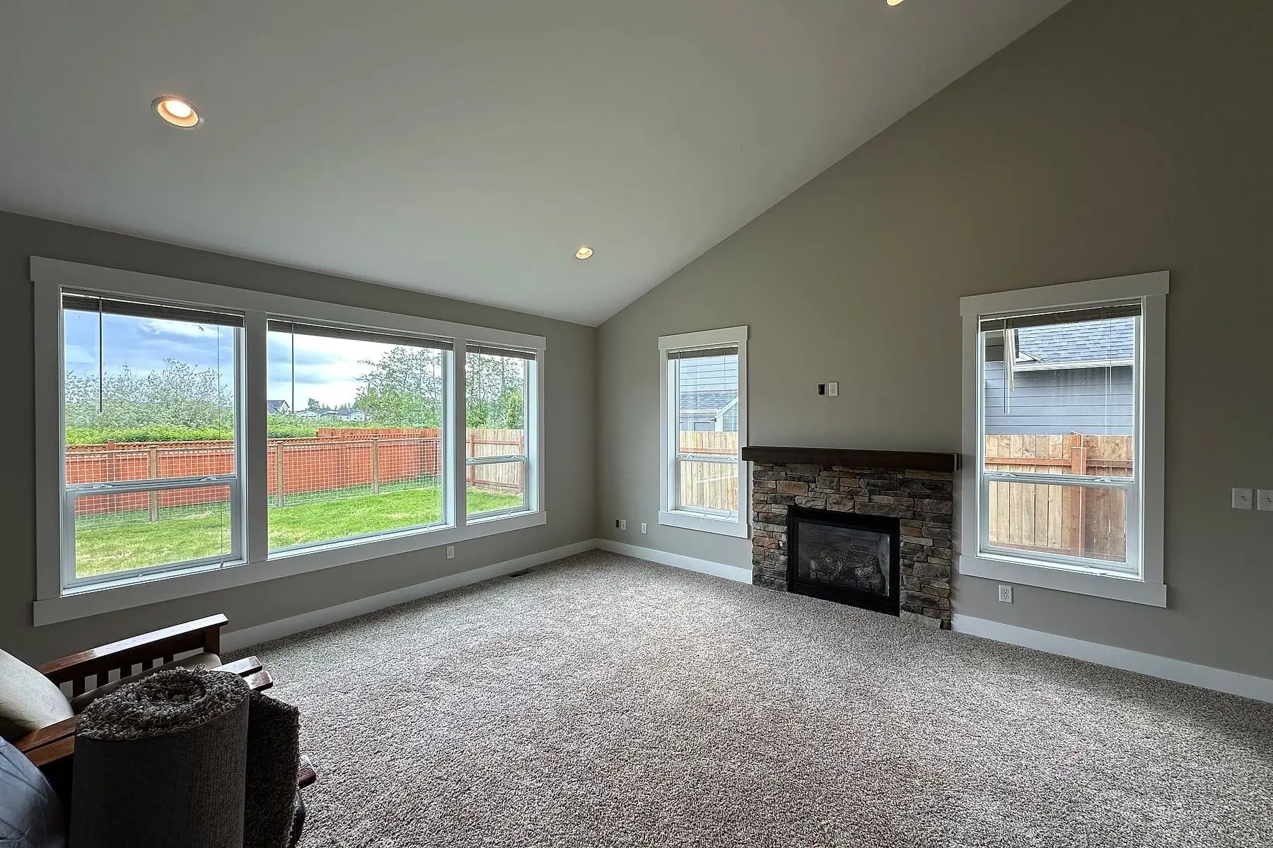 Vaulted living room repainted in Worldly Gray by Hilltop Painting in Ferndale, WA
